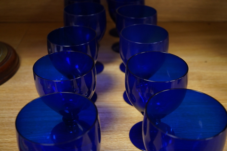 A collection of fourteen Bristol blue glass rummers, largest 15cm high